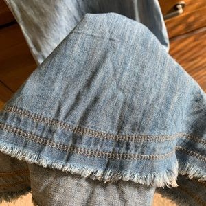 Women’s denim dress with button and fringe detail